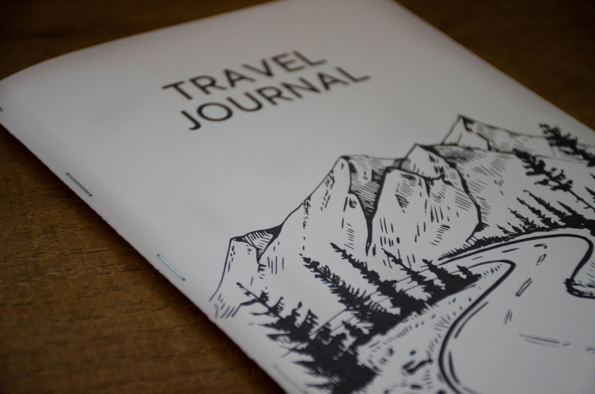 The cover of our free minimal design travel journal