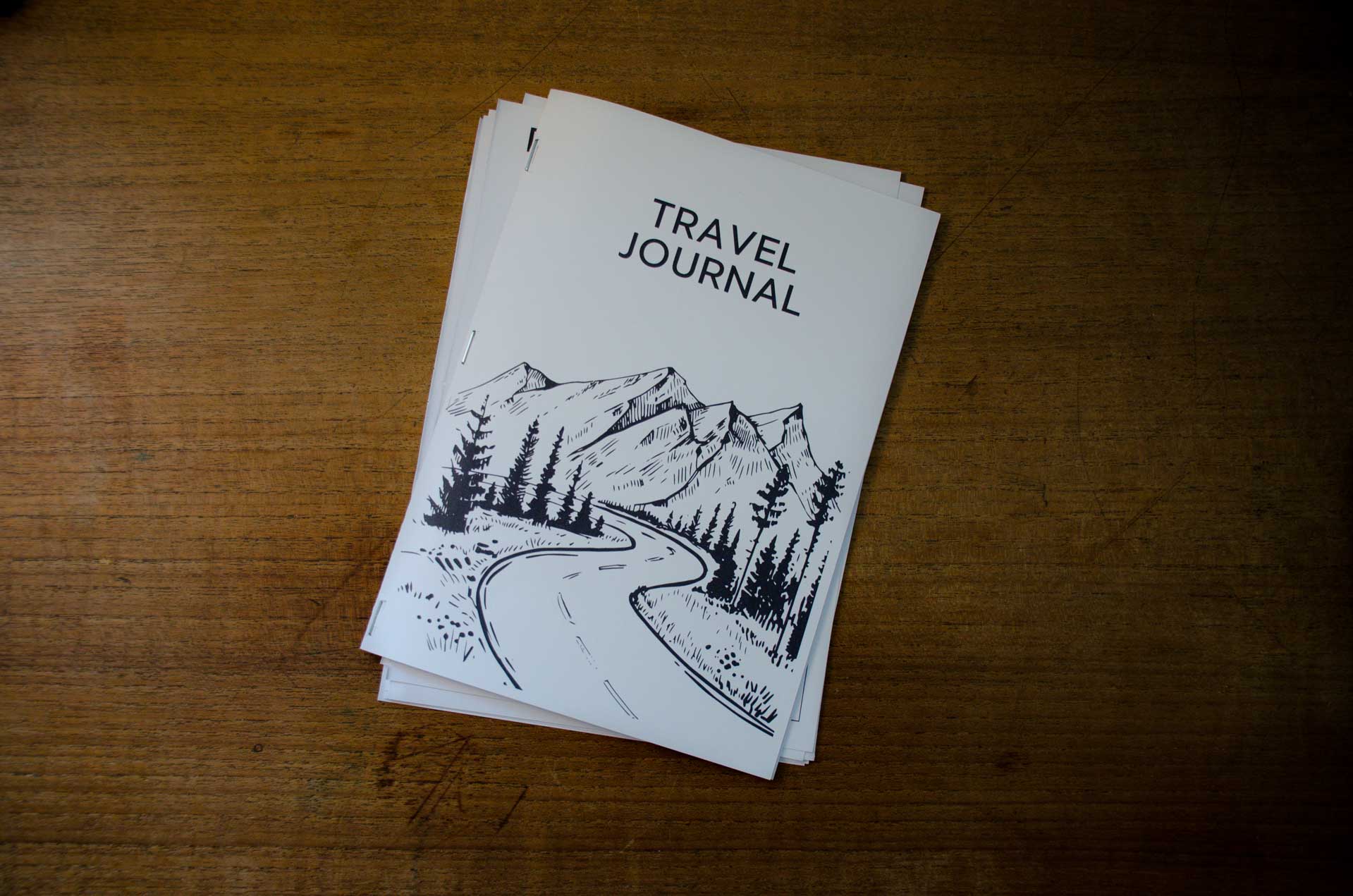 A top down photo of our beautifully crafted diy hipster travel journal